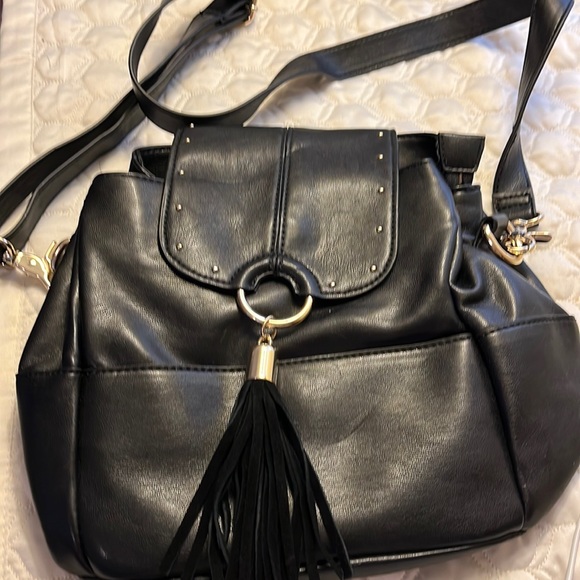 INC International Concepts Handbags - Inc brand from Macy’s! Brand new black small backpack that is a crossbody!